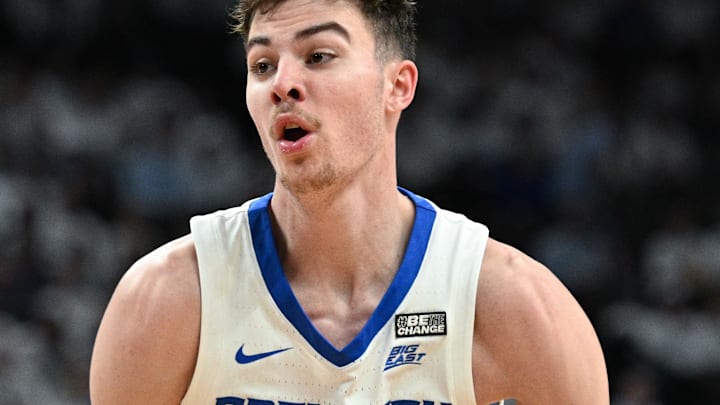 Creighton Bluejays forward Mason Miller (13) passes against the