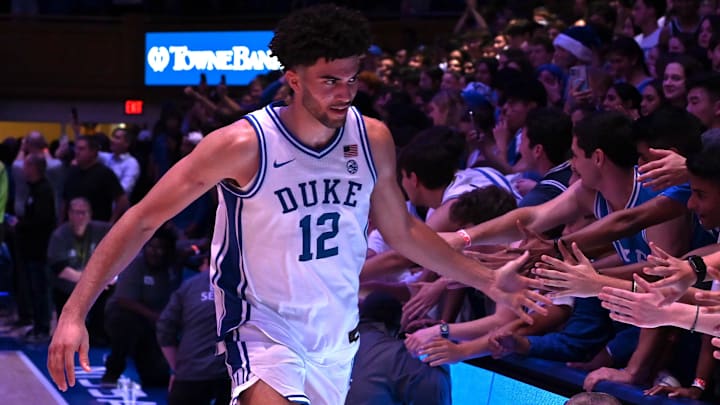 Jan 10, 2026; Durham, North Carolina, USA; Duke Blue Devils forward Cameron Boozer (12) greets fans after a game against the Southern Methodist Mustangs at Cameron Indoor Stadium. Mandatory Credit: Rob Kinnan-Imagn Images
