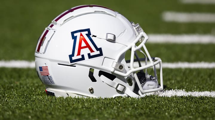 Nov 25, 2022; Tucson, Arizona, USA; Detailed view of an Arizona Wildcats helmet on the field during the Territorial Cup at Arizona Stadium. Mandatory Credit: Mark J. Rebilas-Imagn Images