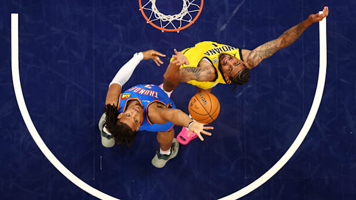 Jun 19, 2025; Indianapolis, Indiana, USA; Oklahoma City Thunder forward Dillon Jones (3) and Indiana Pacers forward Obi Toppin (1) fight for a rebound during the fourth quarter during game six of the 2025 NBA Finals at Gainbridge Fieldhouse. Mandatory Credit: Maddie Meyer-Pool Photo via Imagn Images
