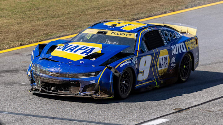 Oct 19, 2025; Talladega, Alabama, USA; NASCAR Cup Series driver Chase Elliott (9) drives into the pit after a wreck during stage one of the YellaWood 500 at Talladega Superspeedway.