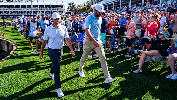 Rory McIlroy and Scottie Scheffler, pictured at the Players Championship, will play together in the first two rounds this week. 