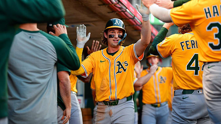 Sep 6, 2025; Anaheim, California, USA; Athletics shortstop Jacob Wilson (5) is greeted after scoring a run against the Los Angeles Angels. during the first inning at Angel Stadium. Mandatory Credit: Gary A. Vasquez-Imagn Images Sep 6, 2025; Anaheim, California, USA; Athletics shortstop Jacob Wilson (5) is greeted after scoring a run against the Los Angeles Angels. during the first inning at Angel Stadium. Mandatory Credit: Gary A. Vasquez-Imagn Images