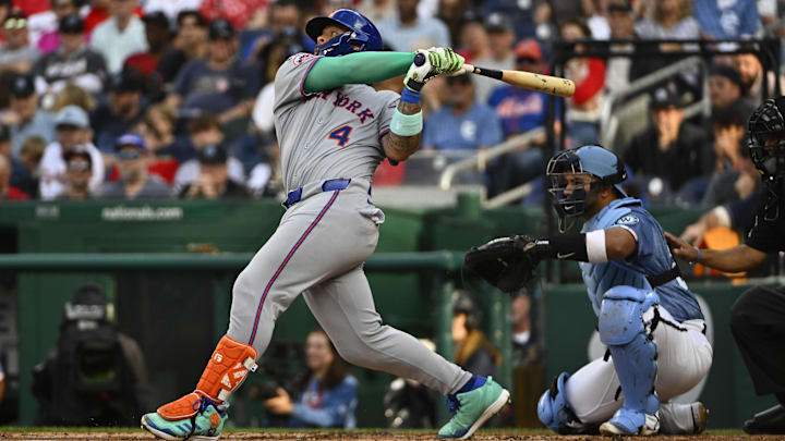 Apr 26, 2025; Washington, District of Columbia, USA; New York Mets catcher Francisco Alvarez (4) hits a two run home run against the Washington Nationals during the second inning at Nationals Park. Mandatory Credit: Brad Mills-Imagn Images Apr 26, 2025; Washington, District of Columbia, USA; New York Mets catcher Francisco Alvarez (4) hits a two run home run against the Washington Nationals during the second inning at Nationals Park. Mandatory Credit: Brad Mills-Imagn Images