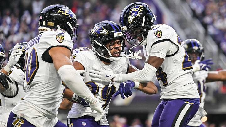 Nov 9, 2025; Minneapolis, Minnesota, USA; Baltimore Ravens safety Keondre Jackson (39) and linebacker Teddye Buchanan (40) and safety Malaki Starks (24) react to a fumble recovery during the third quarter against the Minnesota Vikings at U.S. Bank Stadium. Mandatory Credit: Jeffrey Becker-Imagn Images