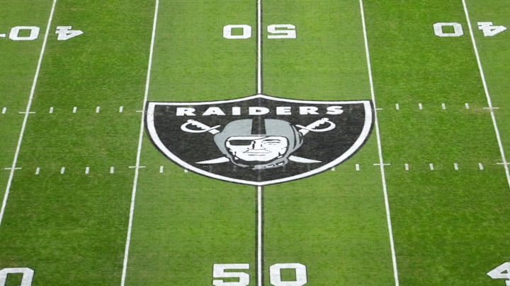 Dec 16, 2024; Paradise, Nevada, USA; The Las Vegas Raiders shield logo at midfield at Allegiant Stadium. Mandatory Credit: Kirby Lee-Imagn Images Dec 16, 2024; Paradise, Nevada, USA; The Las Vegas Raiders shield logo at midfield at Allegiant Stadium. Mandatory Credit: Kirby Lee-Imagn Images