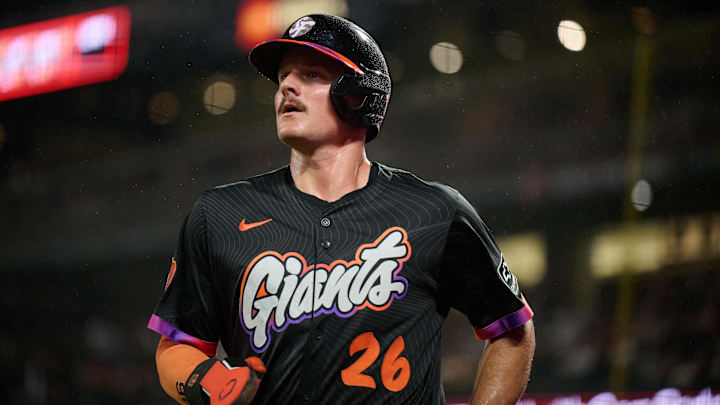 San Francisco Giants infielder Matt Chapman (26) runs to the dugout after scoring a run on a sacrifice fly hit by infielder Casey Schmitt (10) against Arizona Diamondbacks starting pitcher Zac Gallen (23) (not pictured) during the fourth inning at Oracle Park. San Francisco Giants infielder Matt Chapman (26) runs to the dugout after scoring a run on a sacrifice fly hit by infielder Casey Schmitt (10) against Arizona Diamondbacks starting pitcher Zac Gallen (23) (not pictured) during the fourth inning at Oracle Park.