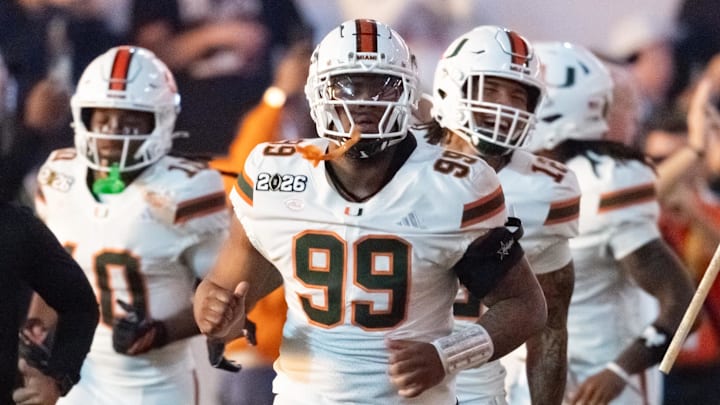 Jan 19, 2026; Miami Gardens, FL, USA; Miami Hurricanes defensive lineman Ahmad Moten Sr. (99) against the Indiana Hoosiers during the College Football Playoff National Championship game at Hard Rock Stadium. Mandatory Credit: Mark J. Rebilas-Imagn Images