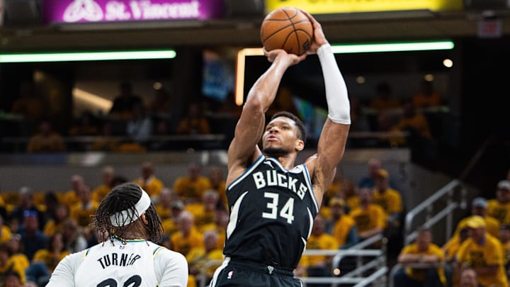 Apr 29, 2025; Indianapolis, Indiana, USA; Milwaukee Bucks forward Giannis Antetokounmpo (34) shoots the ball while Indiana Pacers center Myles Turner (33) defends during game five of the first round for the 2024 NBA Playoffs at Gainbridge Fieldhouse. Mandatory Credit: Trevor Ruszkowski-Imagn Images