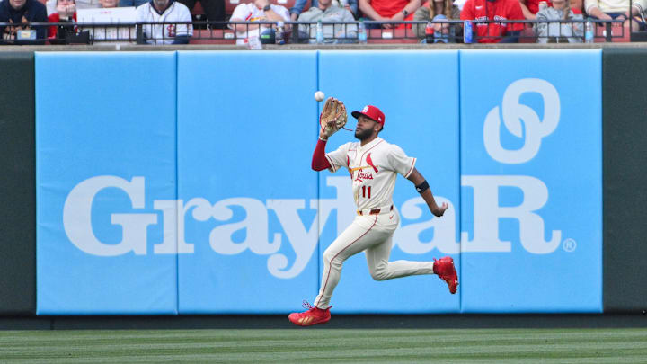 Apr 11, 2026; St. Louis, Missouri, USA; St. Louis Cardinals center fielder Victor Scott II (11) catches a line drive hit by Boston Red Sox shortstop Trevor Story (not pictured) during the second inning at Busch Stadium. Mandatory Credit: Jeff Curry-Imagn Images