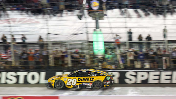 Sep 13, 2025; Bristol, Tennessee, USA; NASCAR Cup Series driver Christopher Bell (20) wins the Bass Pro Shops Night Race at Bristol Motor Speedway. Sep 13, 2025; Bristol, Tennessee, USA; NASCAR Cup Series driver Christopher Bell (20) wins the Bass Pro Shops Night Race at Bristol Motor Speedway.