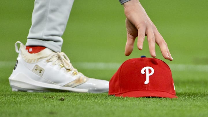 Apr 11, 2025; St. Louis, Missouri, USA; Philadelphia Phillies third baseman Alec Bohm (28) picks up his hat after chasing down a fly ball against the St. Louis Cardinals during the third inning at Busch Stadium. Apr 11, 2025; St. Louis, Missouri, USA; Philadelphia Phillies third baseman Alec Bohm (28) picks up his hat after chasing down a fly ball against the St. Louis Cardinals during the third inning at Busch Stadium.