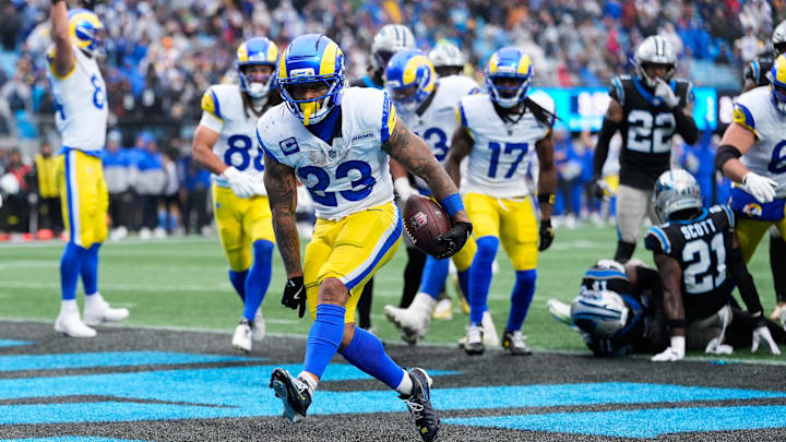 Nov 30, 2025; Charlotte, North Carolina, USA; Los Angeles Rams running back Kyren Williams (23) scores a touchdown during the fourth quarter against the Carolina Panthers at Bank of America Stadium. Mandatory Credit: Jim Dedmon-Imagn Images Nov 30, 2025; Charlotte, North Carolina, USA; Los Angeles Rams running back Kyren Williams (23) scores a touchdown during the fourth quarter against the Carolina Panthers at Bank of America Stadium. Mandatory Credit: Jim Dedmon-Imagn Images