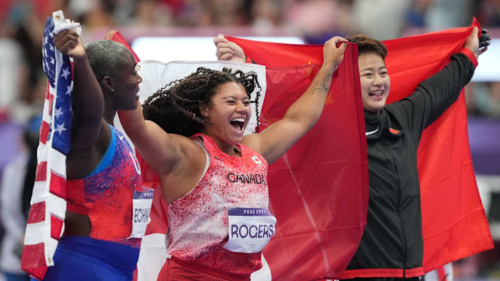 Camry Rogers celebrates her gold medal at Paris.