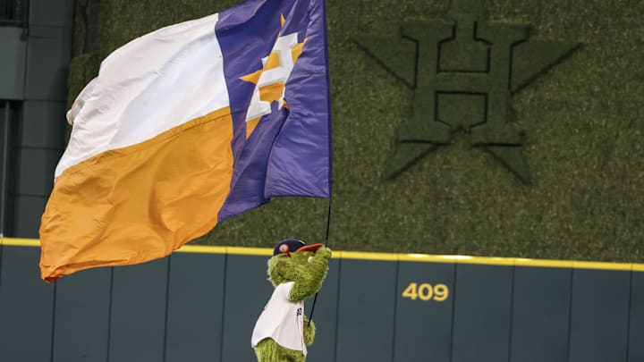 Jun 23, 2024; Houston, Texas, USA;  Houston Astros mascot “Orbit” and the Houston Astros celebrate after defeating the Baltimore Orioles at Minute Maid Park. Mandatory Credit: Thomas Shea-Imagn Images