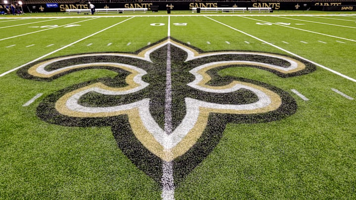 Oct 30, 2022; New Orleans, Louisiana, USA;  General view of the New Orleans Saints logo as the midfield logo fleur-de-lis after the game between the New Orleans Saints and the Las Vegas Raiders at Caesars Superdome. Mandatory Credit: Stephen Lew-Imagn Images