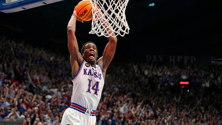 Feb 9, 2026; Lawrence, Kansas, USA; Kansas Jayhawks guard Melvin Council Jr. (14) dunks the ball after defeating the Arizona Wildcats at Allen Fieldhouse. Mandatory Credit: Jay Biggerstaff-Imagn Images Feb 9, 2026; Lawrence, Kansas, USA; Kansas Jayhawks guard Melvin Council Jr. (14) dunks the ball after defeating the Arizona Wildcats at Allen Fieldhouse. Mandatory Credit: Jay Biggerstaff-Imagn Images