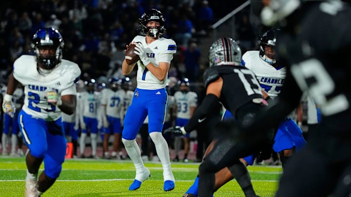 Chandler quarterback Will Mencl (7) looks for receivers during an Open Semifinal game against Hamilton at Dobson High School in Mesa, on Nov. 29, 2025.