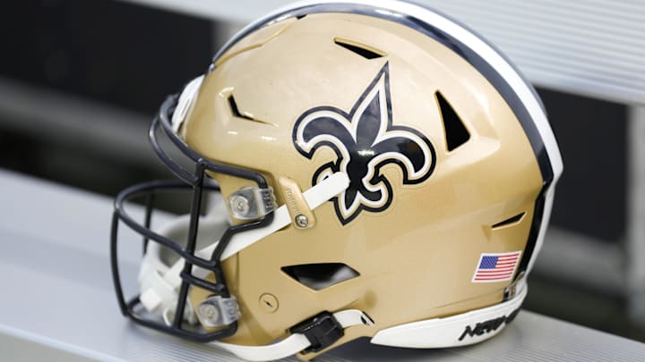 Sep 24, 2023; Green Bay, Wisconsin, USA; An New Orleans Saints helmet during warmups prior to the game against the Green Bay Packers at Lambeau Field. Mandatory Credit: Jeff Hanisch-Imagn Images Sep 24, 2023; Green Bay, Wisconsin, USA; An New Orleans Saints helmet during warmups prior to the game against the Green Bay Packers at Lambeau Field. Mandatory Credit: Jeff Hanisch-Imagn Images