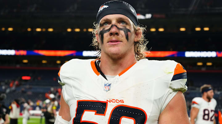 Denver Broncos defensive end Garrett Nelson (59) following a win against the against the Arizona Cardinals at Empower Field at Mile High.