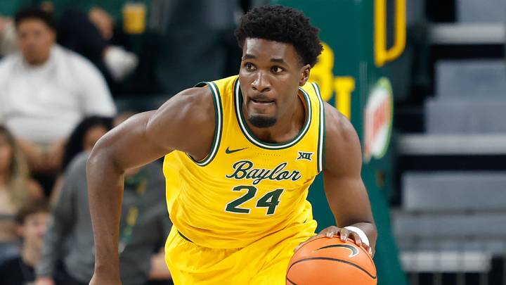 Mar 7, 2026; Waco, Texas, USA;  Baylor Bears guard Tounde Yessoufou (24) dribbles the ball up court against the Utah Utes during the first half at Paul and Alejandra Foster Pavilion. Mandatory Credit: Chris Jones-Imagn Images