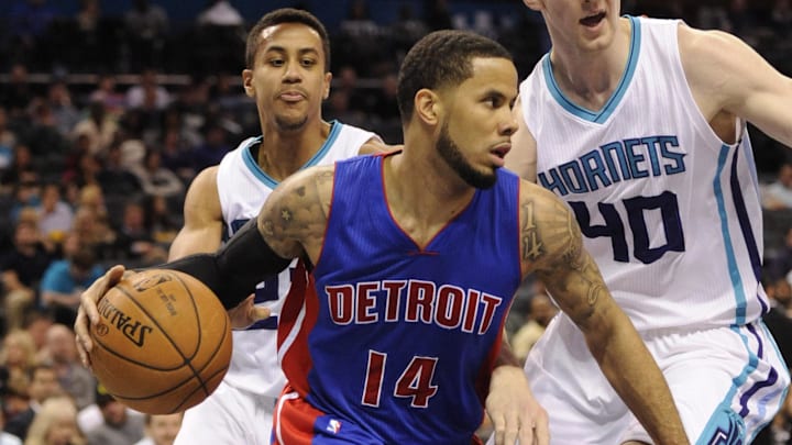 Feb 10, 2015; Charlotte, NC, USA; Detroit Pistons guard D.J. Augustin (14) drives past the Charlotte Hornets defense of forward Cody Zeller (40) and guard Brian Roberts (22) during the first half of the game at Time Warner Cable Arena. Mandatory Credit: Sam Sharpe-Imagn Images Feb 10, 2015; Charlotte, NC, USA; Detroit Pistons guard D.J. Augustin (14) drives past the Charlotte Hornets defense of forward Cody Zeller (40) and guard Brian Roberts (22) during the first half of the game at Time Warner Cable Arena. Mandatory Credit: Sam Sharpe-Imagn Images