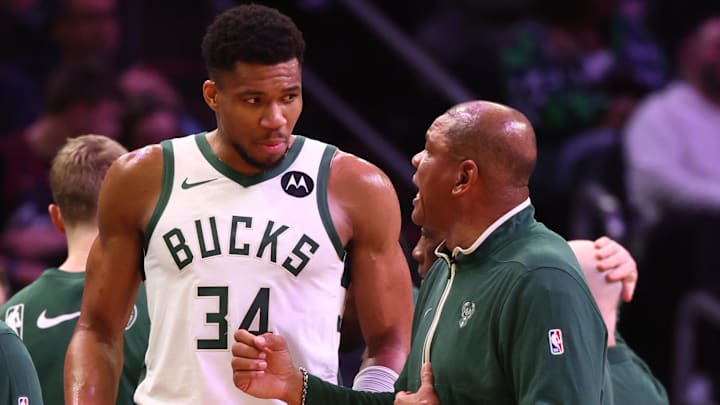 Feb 6, 2024; Phoenix, Arizona, USA; Milwaukee Bucks head coach Doc Rivers talks to forward Giannis Antetokounmpo (34) against the Phoenix Suns at Footprint Center. Mandatory Credit: Mark J. Rebilas-Imagn Images