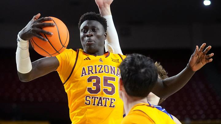 ASU Sun Devils center Massamba Diop (35) grabs a rebound against the Georgia State Panthers at Desert Financial Arena on Nov. 17, 2025. ASU Sun Devils center Massamba Diop (35) grabs a rebound against the Georgia State Panthers at Desert Financial Arena on Nov. 17, 2025.