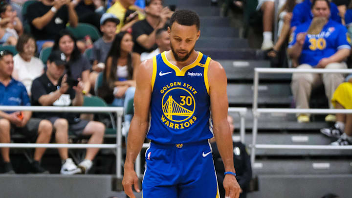 Golden State Warriors guard Stephen Curry 30 walks down court during a timeout on October 5, 2024.