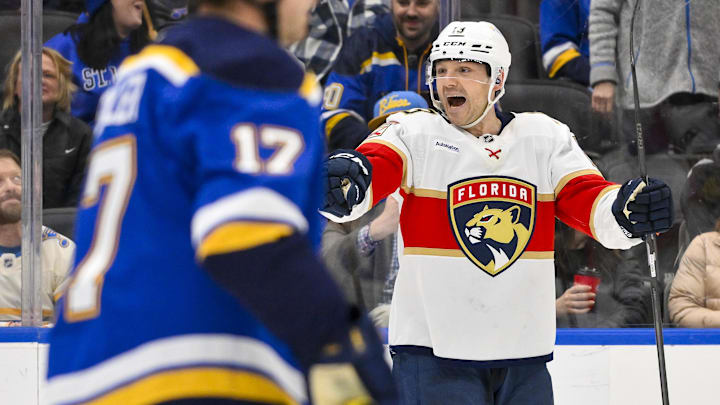 Feb 6, 2025; St. Louis, Missouri, USA;  Florida Panthers center Sam Reinhart (13) reacts after scoring the game winning goal against the St. Louis Blues during the third period at Enterprise Center. Mandatory Credit: Jeff Curry-Imagn Images