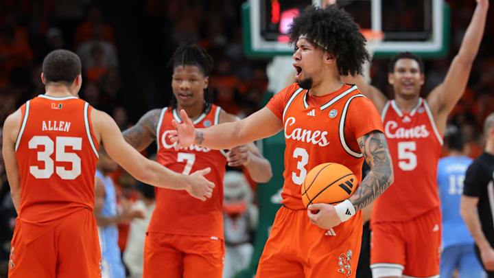 Feb 10, 2026; Coral Gables, Florida, USA; Miami Hurricanes guard Tre Donaldson (3) celebrates against the North Carolina Tar Heels during the second half at Watsco Center. Mandatory Credit: Sam Navarro-Imagn Images