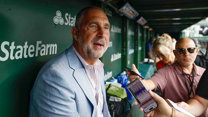 Jul 4, 2025; Chicago, Illinois, USA; St. Louis Cardinals president of baseball operations John Mozeliak speaks before a baseball game against the Chicago Cubs at Wrigley Field. Mandatory Credit: Kamil Krzaczynski-Imagn Images