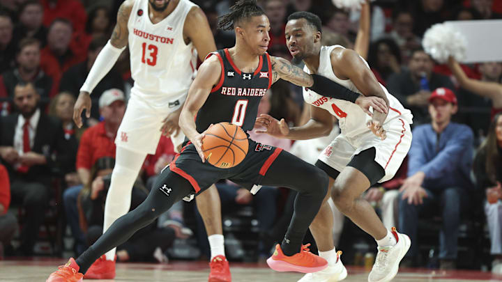 Jan 17, 2024; Houston, Texas, USA; Texas Tech Red Raiders guard Chance McMillian (0) controls the