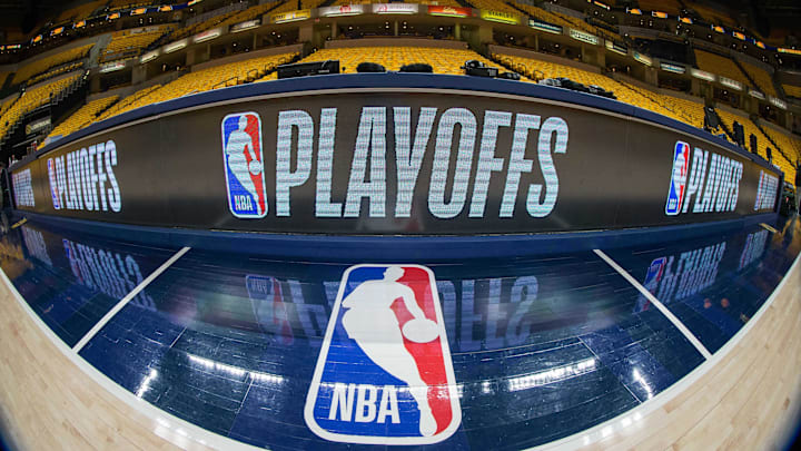 Apr 27, 2018; Indianapolis, IN, USA; A general view of the NBA logo and the playoffs scorer table before game six between the Indiana Pacers and the Cleveland Cavaliers in the first round of the 2018 NBA Playoffs at Bankers Life Fieldhouse. Mandatory Credit: Trevor Ruszkowski-Imagn Images