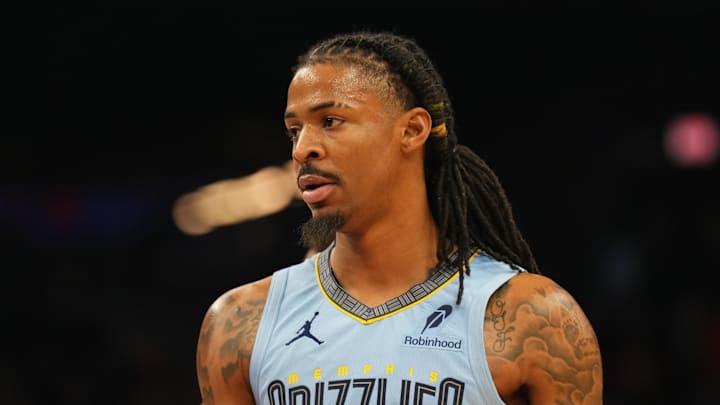 Feb 11, 2025; Phoenix, Arizona, USA; Memphis Grizzlies guard Ja Morant (12) looks on against the Phoenix Suns during the first half at Footprint Center. Mandatory Credit: Joe Camporeale-Imagn Images
