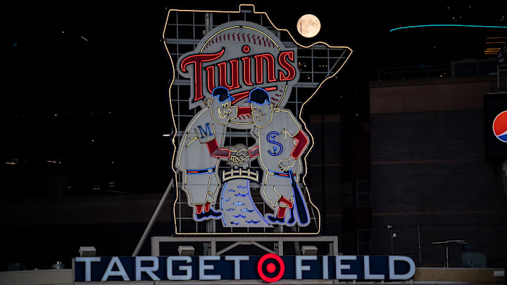 Sep 1, 2020; Minneapolis, Minnesota, USA; A full moon rises over the Minnesota Twins logo in a game between the Minnesota Twins and Chicago White Sox at Target Field. 