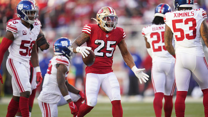 San Francisco 49ers running back Elijah Mitchell reacts after rushing for a first down against the New York Giants.