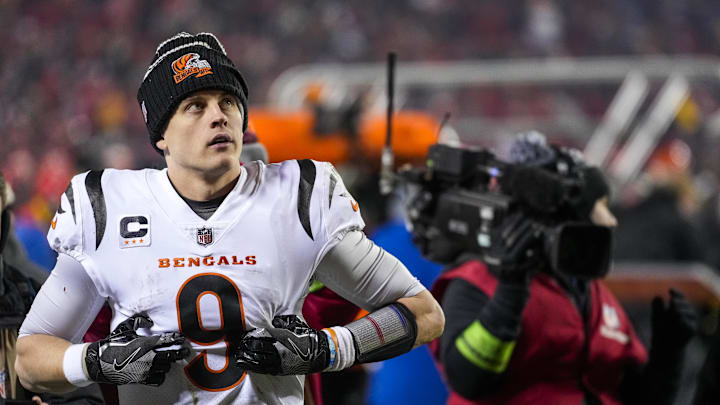 Jan 29, 2023; Kansas City, Missouri, USA; Cincinnati Bengals quarterback Joe Burrow (9) watches the video board as he walks for the locker room after the fourth quarter of the AFC championship NFL game between the Cincinnati Bengals and the Kansas City Chiefs, Sunday, Jan. 29, 2023, at Arrowhead Stadium in Kansas City, Mo. The Kansas City Chiefs advanced to the Super Bowl with a 23-20 win over the Bengals. Mandatory Credit: Sam Greene-Imagn Images