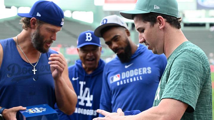 Boston Red Sox starting pitcher Walker Buehler (0) receives his 2024 Los Angeles Dodgers World Series ring before a game at Fenway Park on July 25, 2025