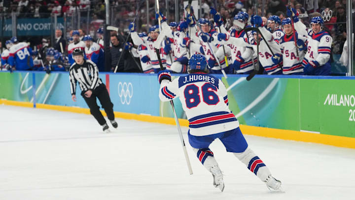 Feb 20, 2026; Milan, Italy; Jack Hughes (86) of the United States celebrates after scoring a goal during the second period against Slovakia in a men's ice hockey semifinal during the Milano Cortina 2026 Olympic Winter Games at Milano Santagiulia Ice Hockey Arena. Mandatory Credit: James Lang-Imagn Images