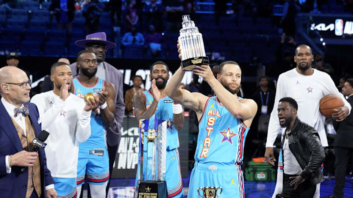Shaq’s OGs guard Stephen Curry (30) of the Golden State Warriors celebrates with the MVP trophy after defeating Chuck’s Global Stars during the 2025 NBA All Star Game at Chase Center. 