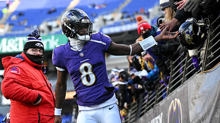 Jan 4, 2025; Baltimore, Maryland, USA; Baltimore Ravens quarterback Lamar Jackson (8) arrives before the game against the Cleveland Browns at M&T Bank Stadium. Mandatory Credit: Tommy Gilligan-Imagn Images
