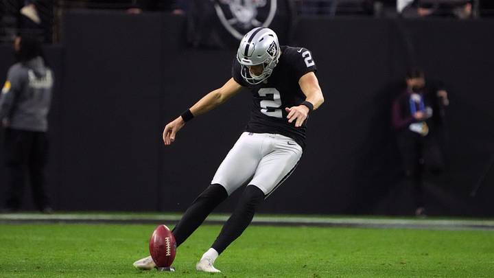 Dec 26, 2021; Paradise, Nevada, USA; Las Vegas Raiders kicker Daniel Carlson (2) kicks the ball on a kickoff against the Denver Broncos in the second half at Allegiant Stadium. Mandatory Credit: Kirby Lee-USA TODAY Sports