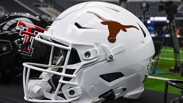 Jul 12, 2023; Arlington, TX, USA; A view of the Texas Longhorns helmet and logo during Big 12 football media day at AT&T Stadium. Mandatory Credit: Jerome Miron-Imagn Images Jul 12, 2023; Arlington, TX, USA; A view of the Texas Longhorns helmet and logo during Big 12 football media day at AT&T Stadium. Mandatory Credit: Jerome Miron-Imagn Images