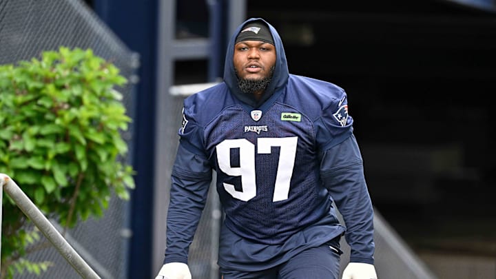 Jun 9, 2025; Foxborough, MA, USA; New England Patriots defensive end Milton Williams (97) walks to the practice fields at Gillette Stadium. Mandatory Credit: Eric Canha-Imagn Images Jun 9, 2025; Foxborough, MA, USA; New England Patriots defensive end Milton Williams (97) walks to the practice fields at Gillette Stadium. Mandatory Credit: Eric Canha-Imagn Images
