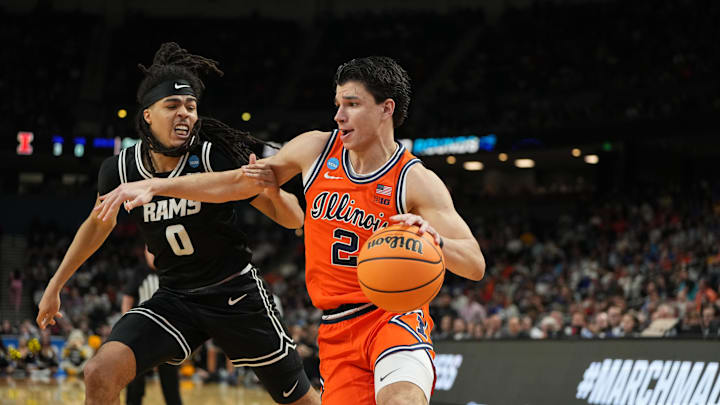 Mar 21, 2026; Greenville, SC, USA; VCU Rams guard Brandon Jennings (0) defends against Illinois Fighting Illini guard Andrej Stojakovic (2) during the second half during a second round game of the men's 2026 NCAA Tournament at Bon Secours Wellness Arena. Mandatory Credit: Bob Donnan-Imagn Images Mar 21, 2026; Greenville, SC, USA; VCU Rams guard Brandon Jennings (0) defends against Illinois Fighting Illini guard Andrej Stojakovic (2) during the second half during a second round game of the men's 2026 NCAA Tournament at Bon Secours Wellness Arena. Mandatory Credit: Bob Donnan-Imagn Images