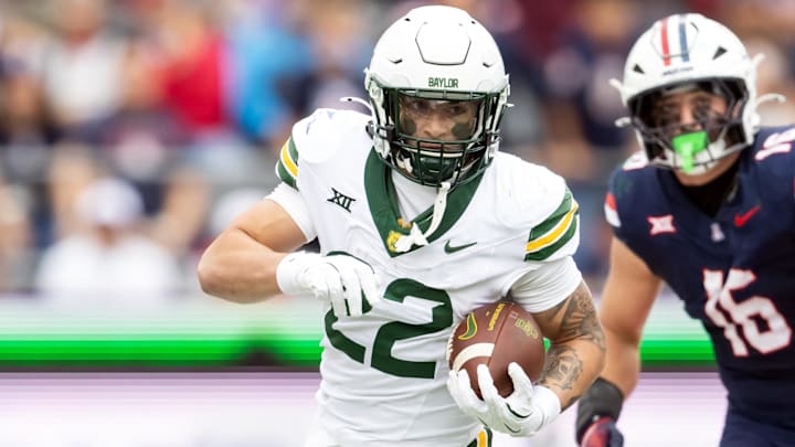 Nov 22, 2025; Tucson, Arizona, USA; Baylor Bears running back Caden Knighten (22) against the Arizona Wildcats at Casino Del Sol Stadium. Mandatory Credit: Mark J. Rebilas-Imagn Images