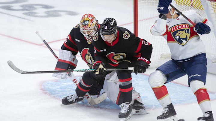Oct 10, 2024; Ottawa, Ontario, CAN; Florida Panthers center Evan Rodrigues  (17) is unable to capilaize on a loose puck next to Ottawa Senators goalie Linus Ulmark (35) in the third period at the Canadian Tire Centre. Mandatory Credit: Marc DesRosiers-Imagn Images
