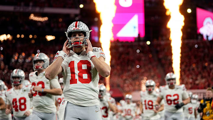 Ohio State Buckeyes quarterback Will Howard (18) take the field for the start of the game against Notre Dame Fighting Irish during the College Football Playoff National Championship at Mercedes-Benz Stadium in Atlanta on January 20, 2025.
