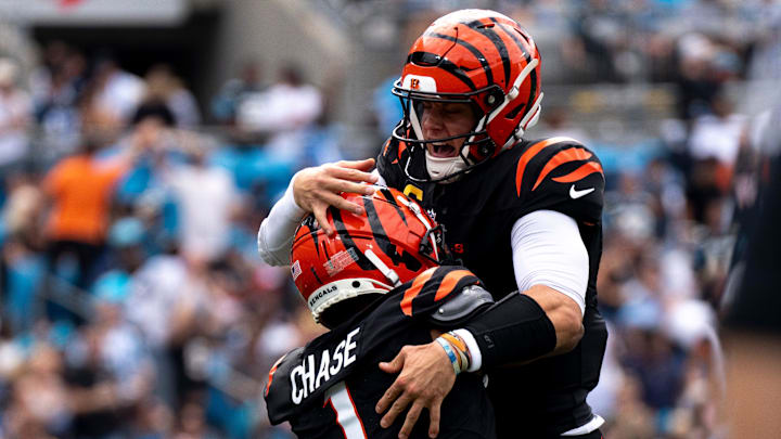 Cincinnati Bengals wide receiver Ja'Marr Chase (1) celebrates with Cincinnati Bengals quarterback Joe Burrow (9) after scoring a touchdown in the second quarter of the NFL game against the Carolina Panthers at Bank of America Stadium in Charlotte, N.C., on Sunday, Sept. 29, 2024.